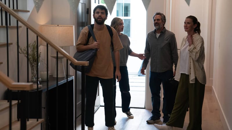 Hal, Harper and their parents arriving through the front door