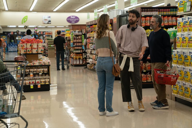 A supermarket aisle scene, dressed with full grocery shelving